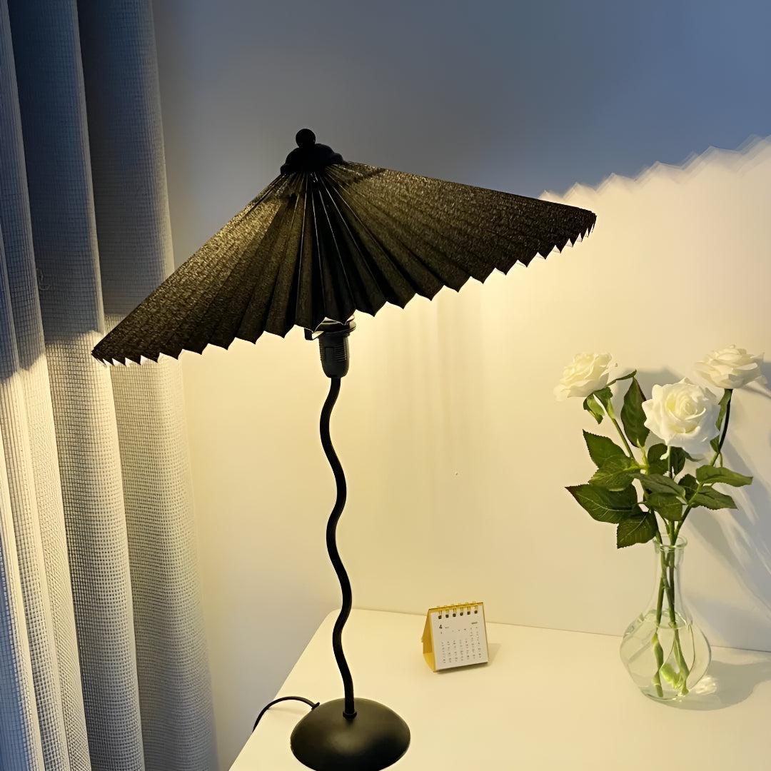 Bedside Table Lamp With Pleated Shade And Squiggled Curved Stem