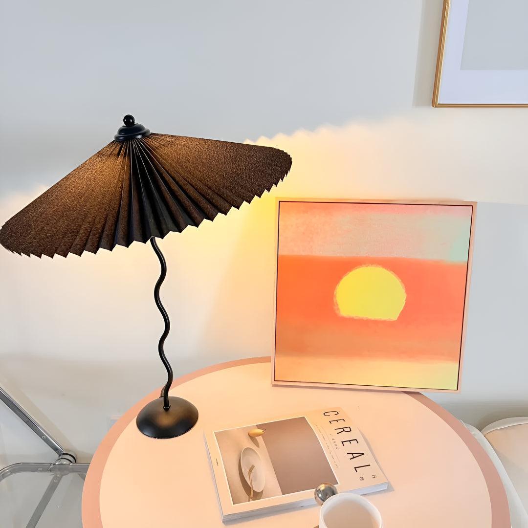 Bedside Table Lamp With Pleated Shade And Squiggled Curved Stem